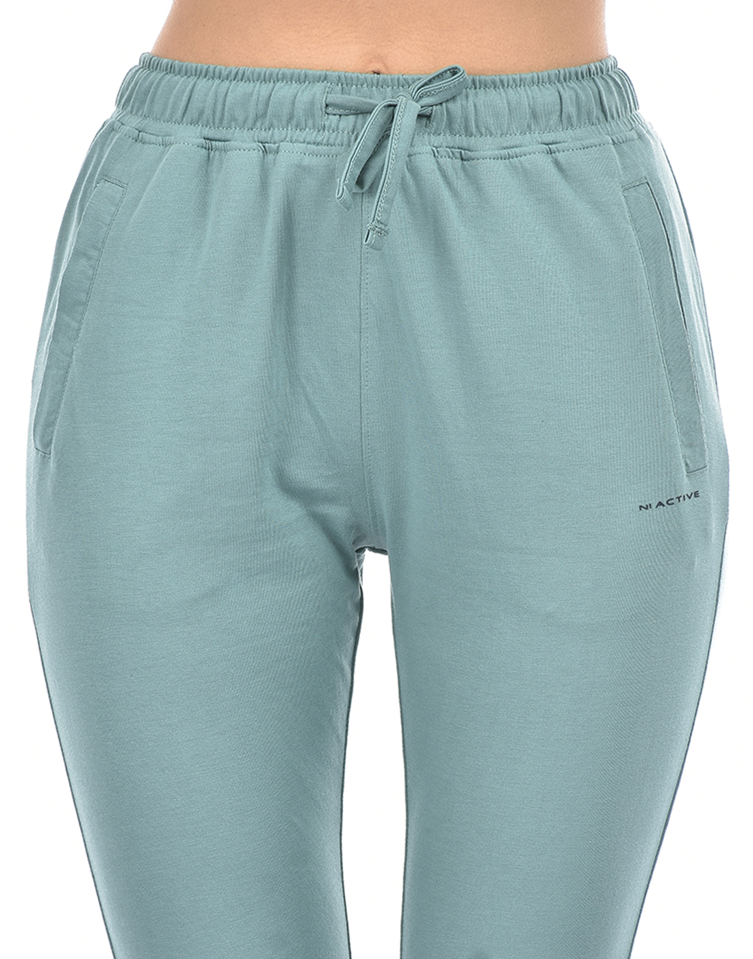 Numero Uno Women Solid Green Track Pants